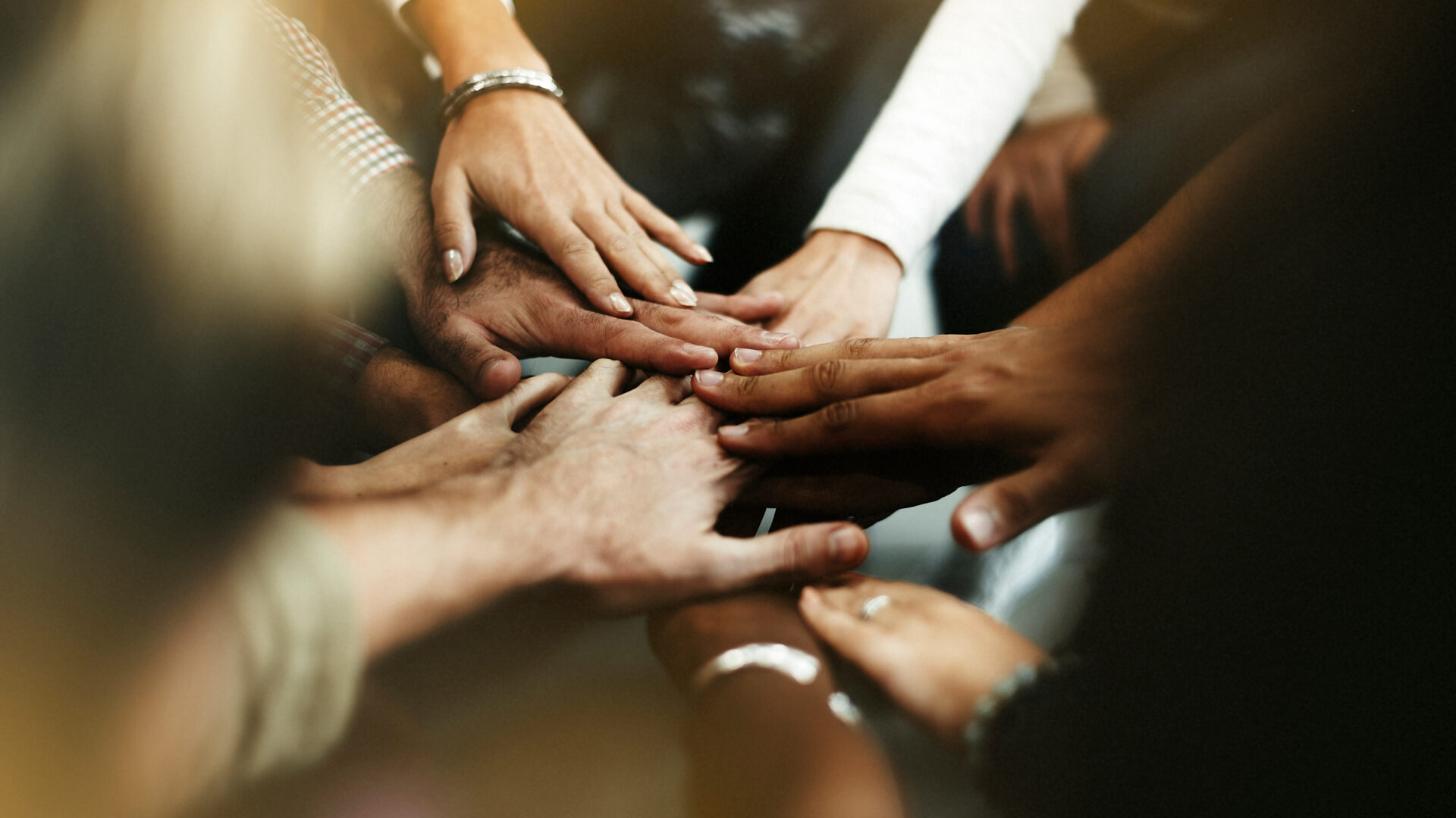 Closeup,Of,Diverse,People,Joining,Their,Hands